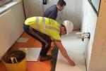 Floor tile fitting